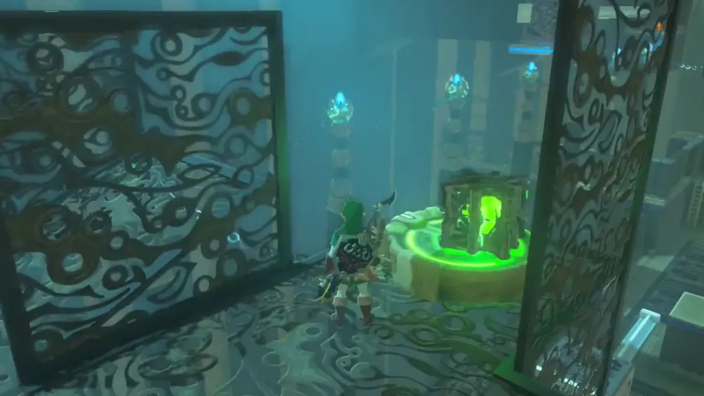 The metal cube sitting on the round charge plate glowing green