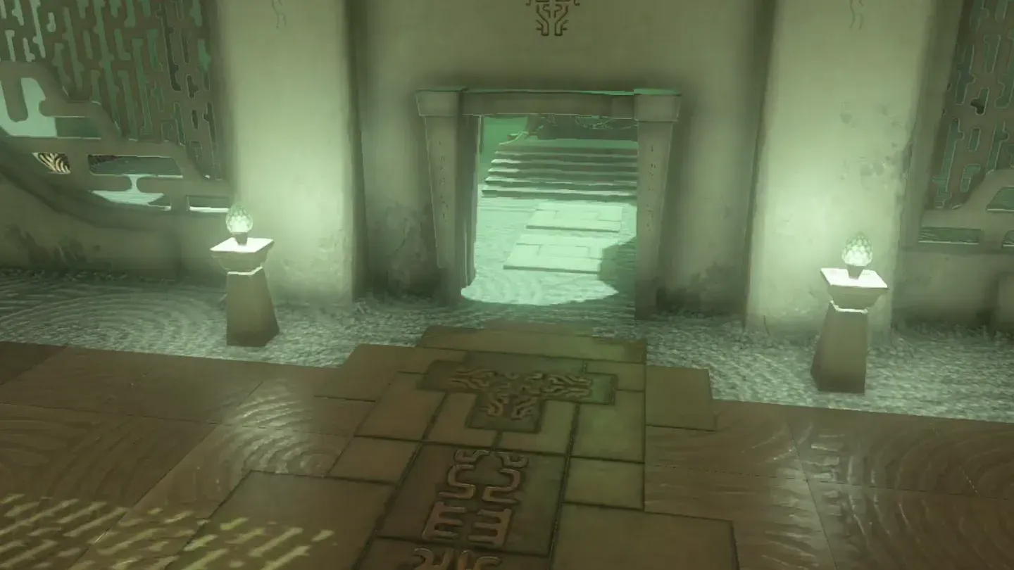 The gate ahead standing open between two lanterns