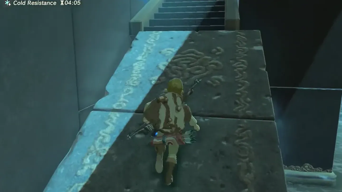 Link walking up the tilted slab toward the stairs