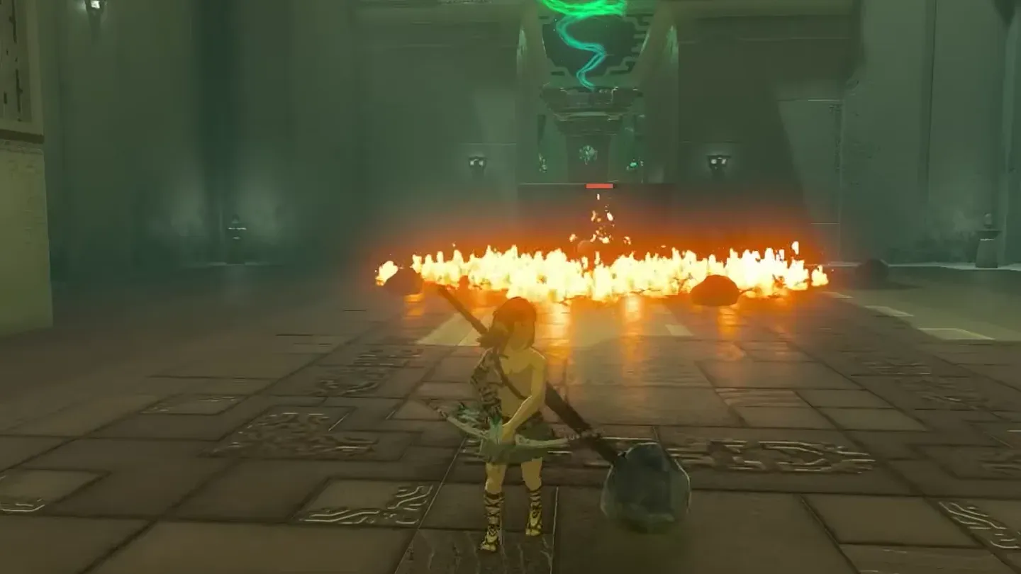 A line of fire burning across the leaves in front of Link