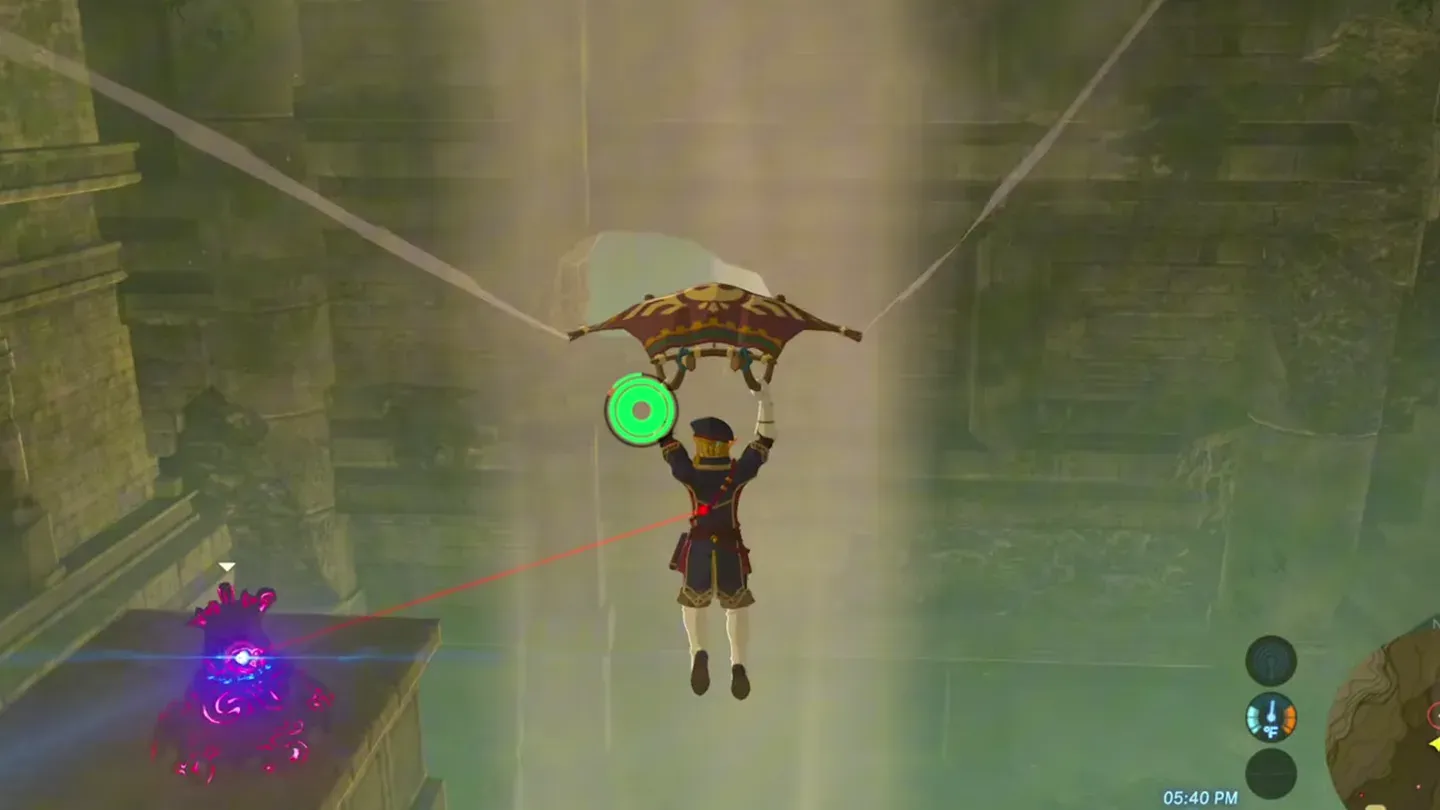 Link paragliding in the Forgotten Temple while a Decayed Guardian on a ledge aims a laser at him