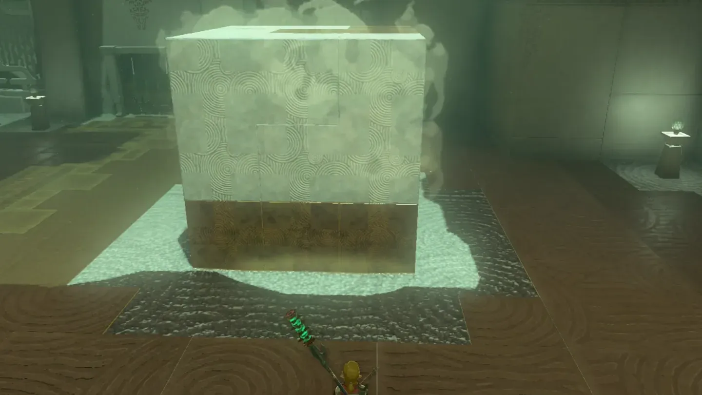 The completed cube with puffs of smoke coming off it