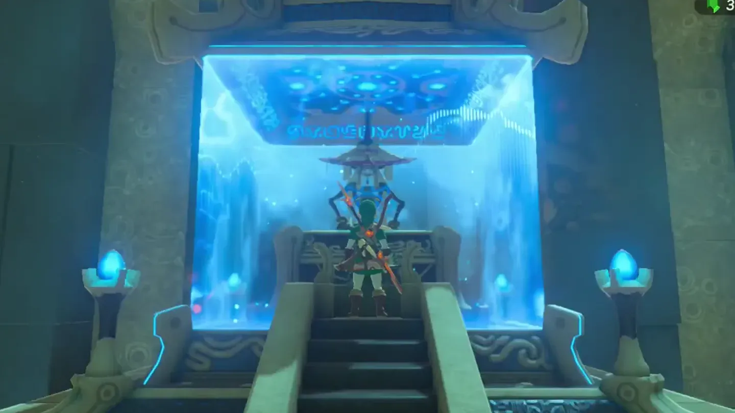 The monk seated behind a glowing blue barrier