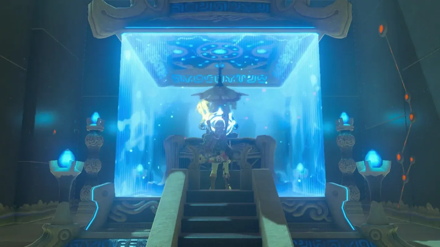 The monk seated behind a glowing blue barrier