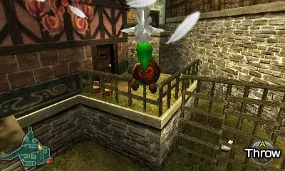 Young Link holds a Cucco over his head on a fenced ledge beside a half-timbered house in Kakariko Village