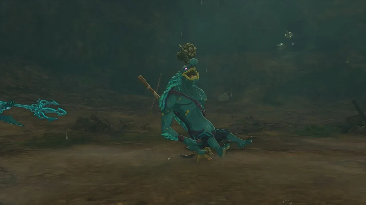 A Blue Horriblin with a blue mane and a spiky hammer-shaped horn sitting dazed on a dark cave floor, its spear lying beside it