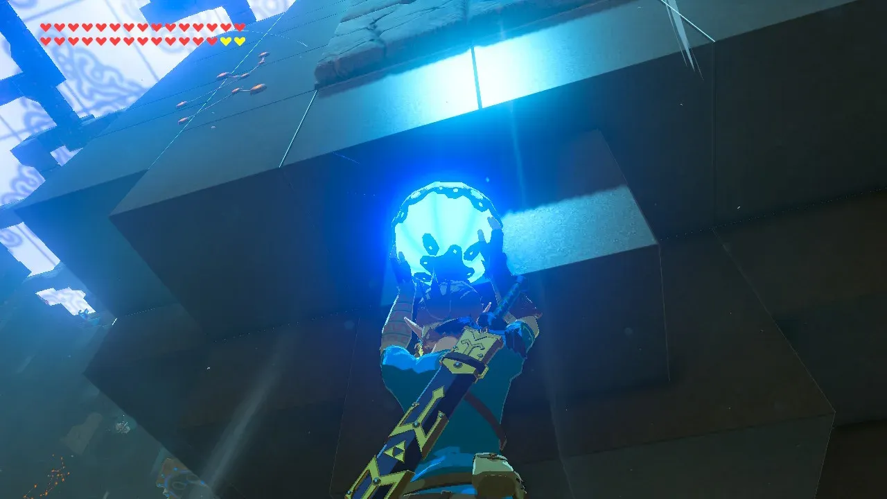 Holding a Remote Bomb over the vent, with the breakable stones overhead