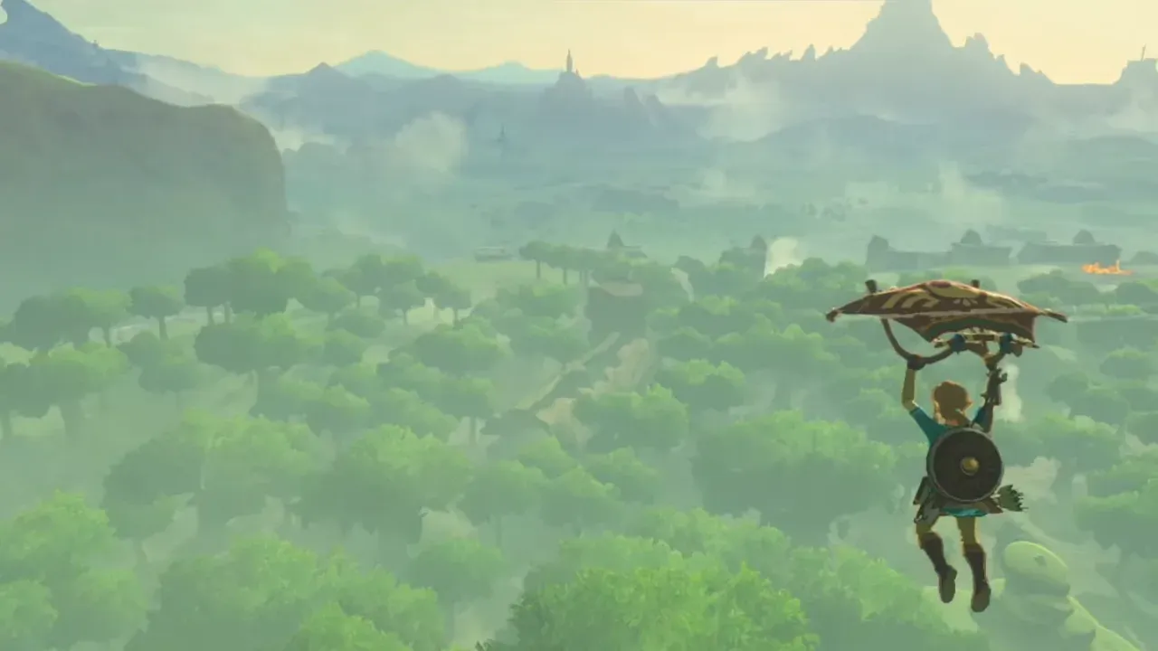 Link gliding high over a forest with mountains in the distance