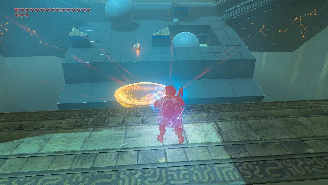The metal bowl catching objects from the sloping platform