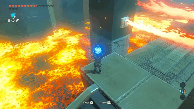 The cracked stone base beneath a flame column