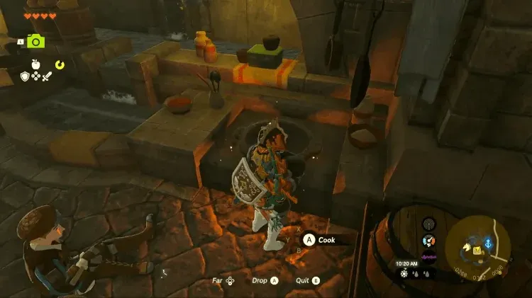 Link standing at a lit cooking pot with the Cook prompt on screen