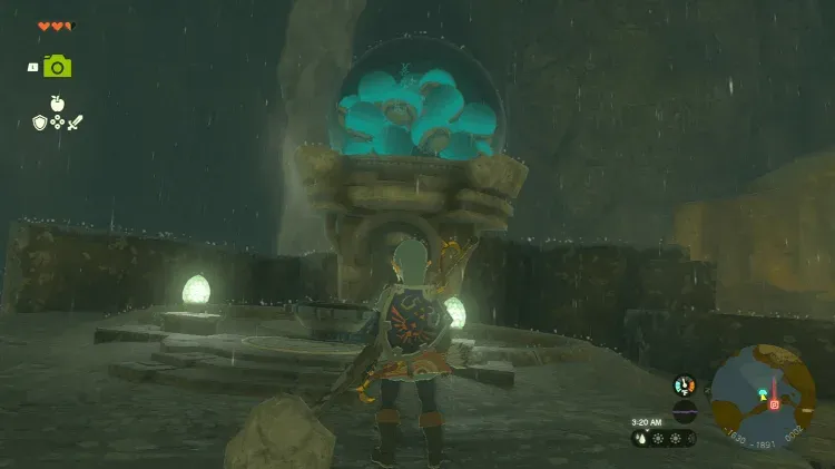 Link in front of a Device Dispenser at night, its glass dome full of capsules
