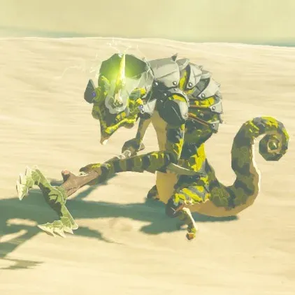 A yellow and black Electric Lizalfos with a glowing green horn in the desert