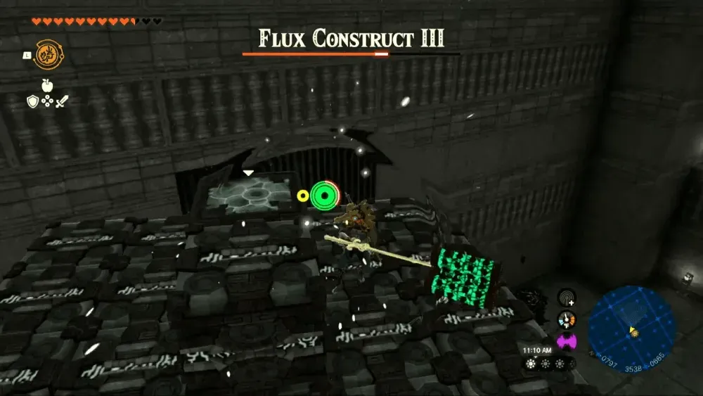 Link standing on top of a Flux Construct III and swinging at its glowing green core cube, with its health bar at the top