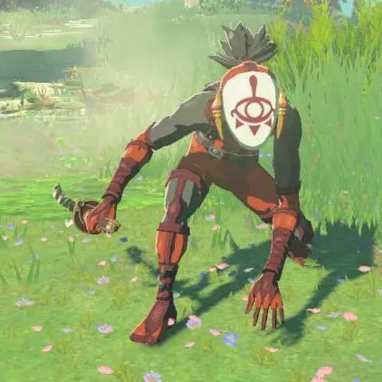 A crouching Yiga Footsoldier in a red bodysuit and white eye mask holding a curved blade on a grassy field