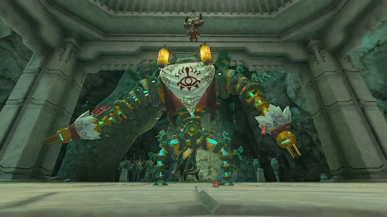 A huge construct painted with the Yiga eye standing in the mine, with Master Kohga perched on top