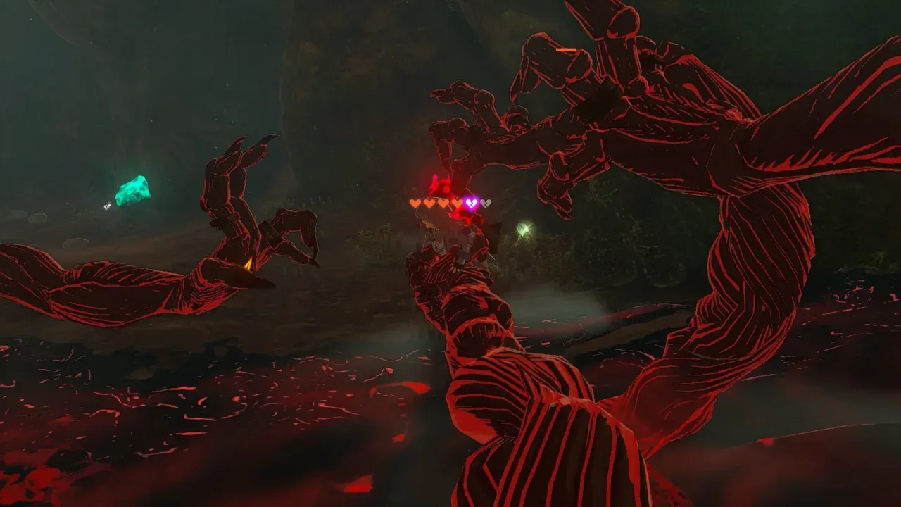 Red Gloom Spawn arms reaching across the screen around Link, with damaged red hearts at the top