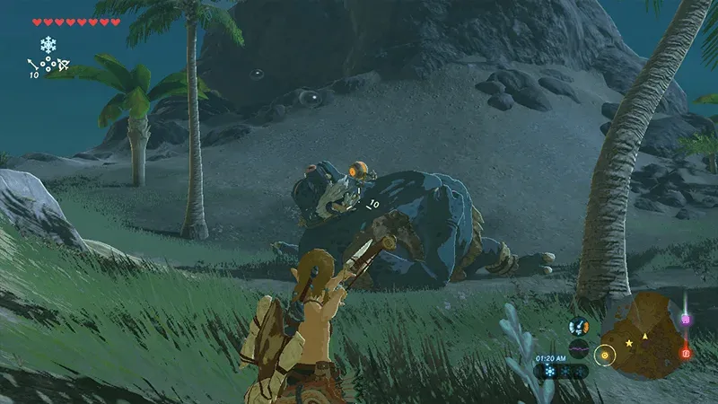 Link draws his bow on a grassy slope above a sleeping Blue Hinox lying on the sand