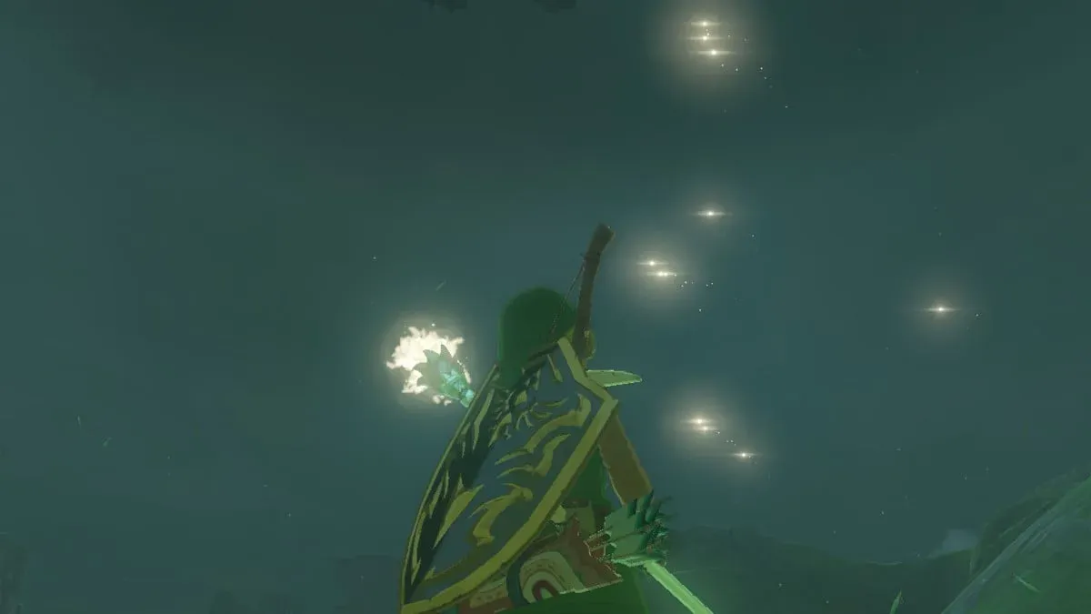 White light orbs in front of Link's magic weapon