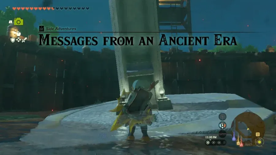 Link standing in front of the fallen stone tablet in Lookout Landing as the quest title appears