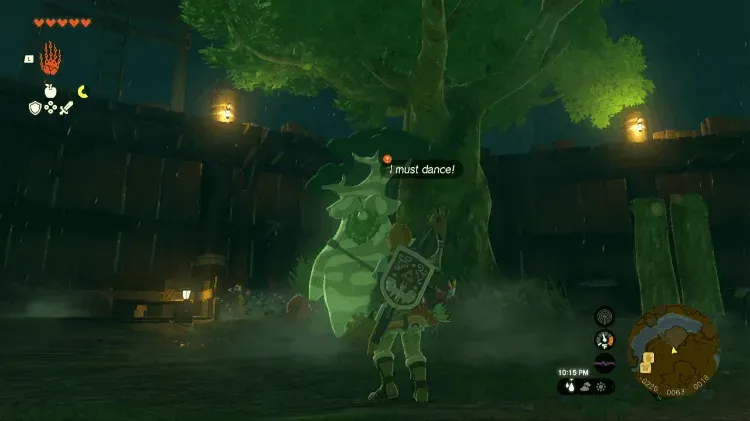 Hestu under a large tree at Lookout Landing at night
