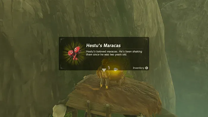 Link opening a chest on a camp lookout and getting Hestu's Maracas