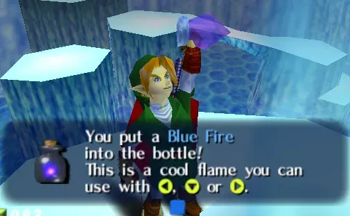 Adult Link holds up a bottle in the Ice Cavern above the message You put a Blue Fire into the bottle