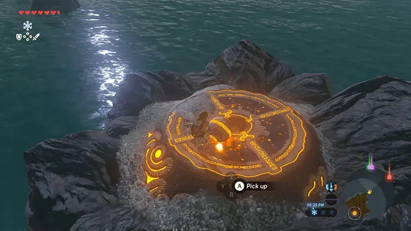 A round altar glowing orange on a rock in the sea, with Link standing in the middle