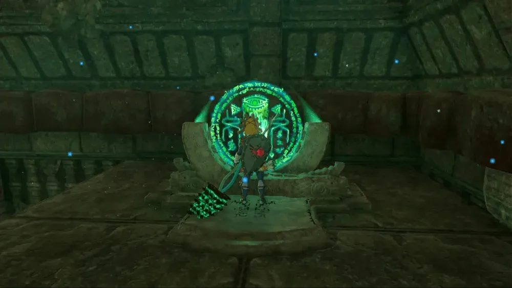 Link standing in front of a glowing green Zonai terminal inside a stone room of the sky labyrinth