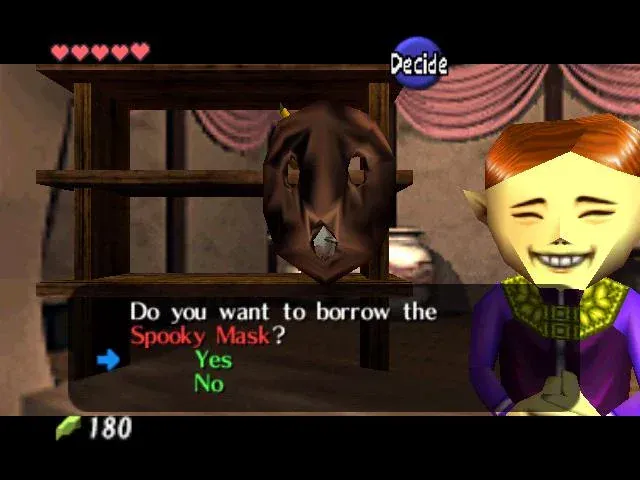 The Happy Mask shopkeeper smiling beside the wooden Spooky Mask, with the question Do you want to borrow the Spooky Mask on screen