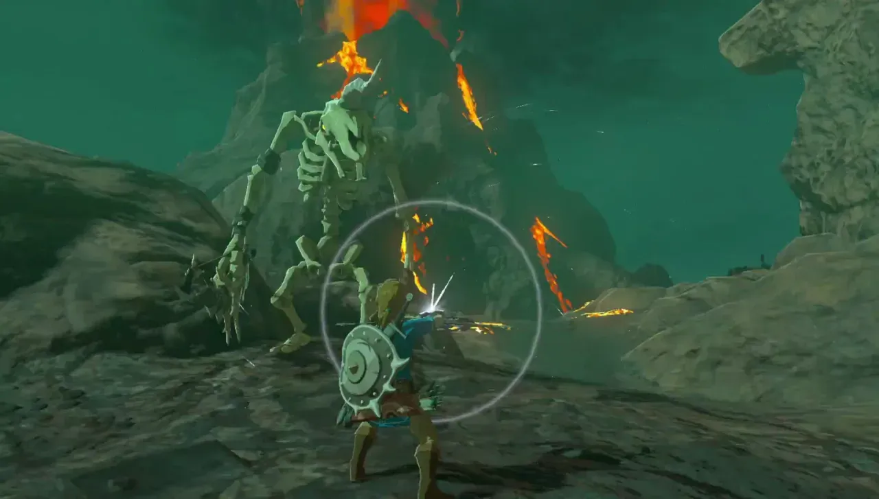A tall horned Stalmoblin skeleton looming over Link under a lava-streaked volcano