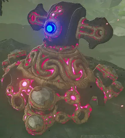 A Guardian Turret with a blue eye and pink-glowing markings sitting on its legless base